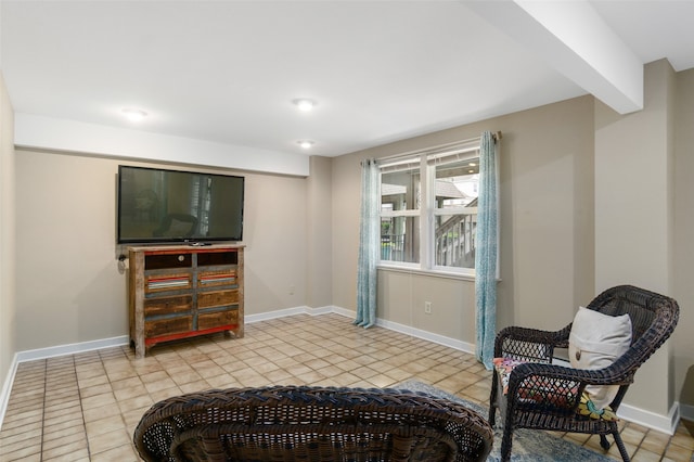 living area with light tile flooring