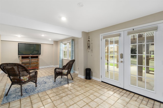 living room with french doors and light tile floors