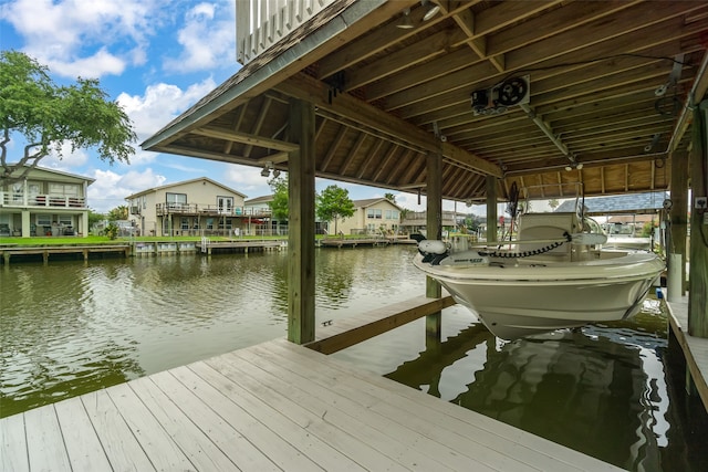 view of dock with a water view