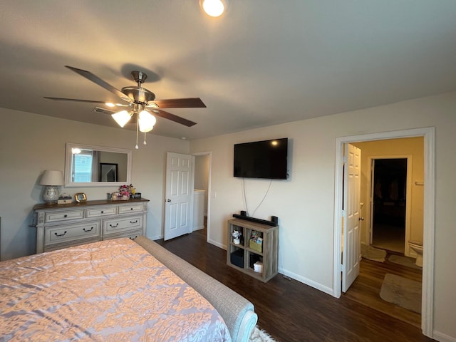 bedroom with ceiling fan and dark hardwood / wood-style flooring