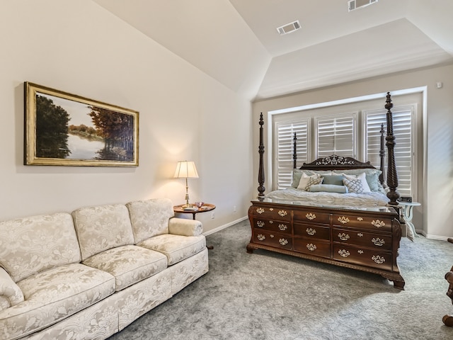 carpeted living room featuring vaulted ceiling