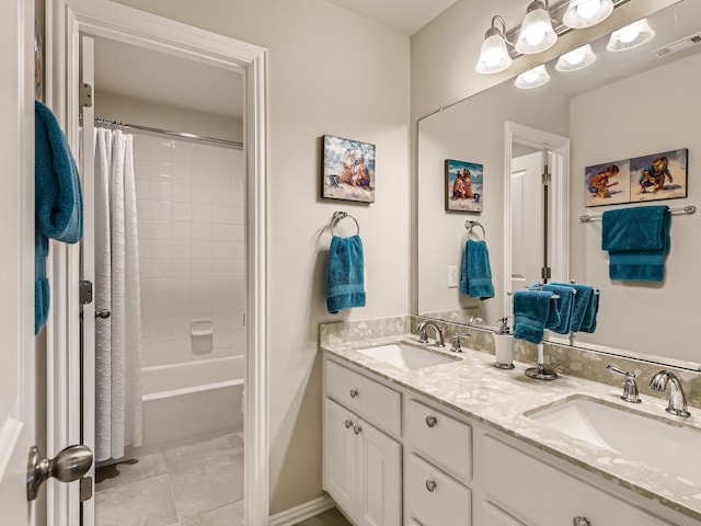 bathroom with tile patterned floors, vanity, and shower / bath combination with curtain