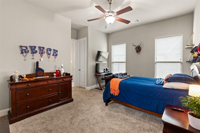 carpeted bedroom featuring ceiling fan