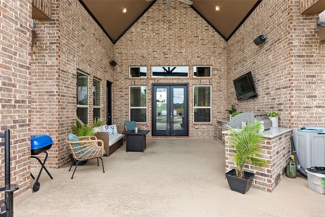 view of patio with french doors and an outdoor hangout area