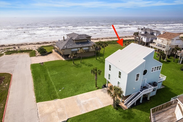 aerial view featuring a beach view and a water view