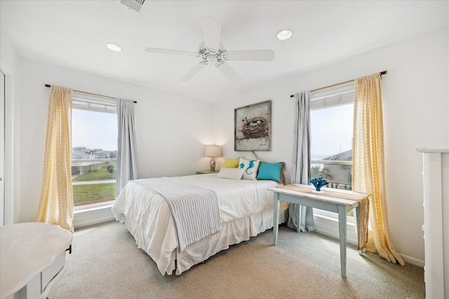 carpeted bedroom featuring ceiling fan