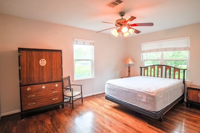 bedroom featuring wood-type flooring and ceiling fan