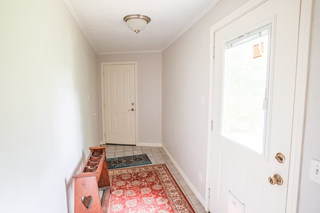 doorway to outside with ornamental molding and light tile flooring