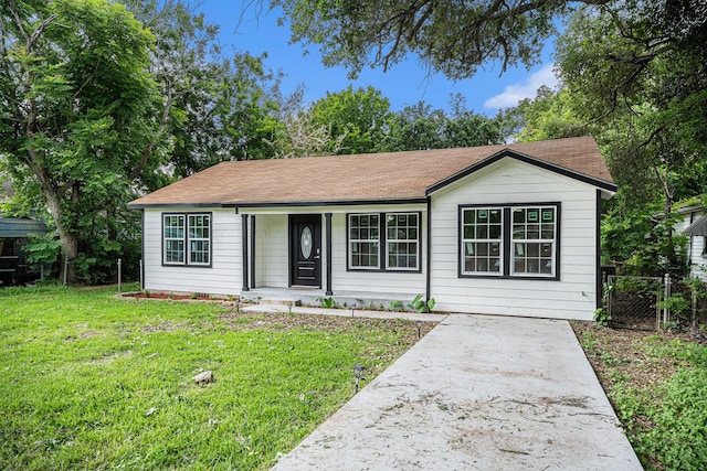 ranch-style home with a front yard