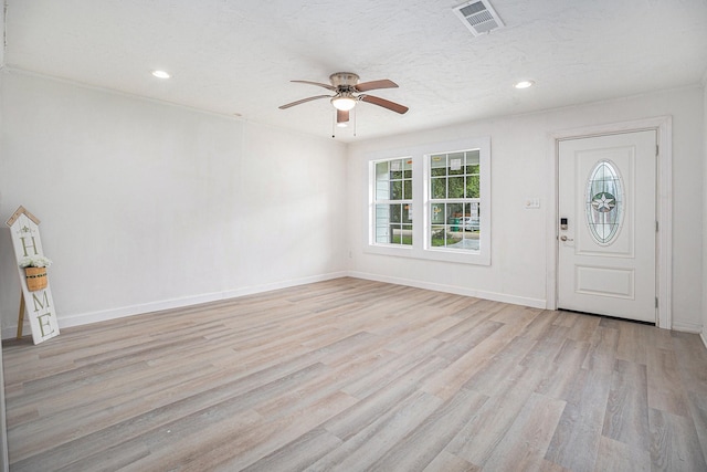 entrance foyer featuring ceiling fan and light hardwood / wood-style floors