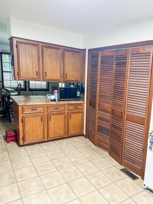 kitchen featuring light tile patterned floors