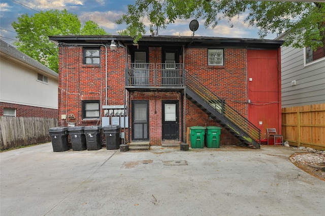 exterior space with a patio area and a balcony