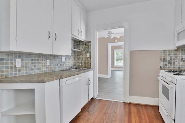 kitchen with ceiling fan, white appliances, tasteful backsplash, dark hardwood / wood-style flooring, and white cabinetry