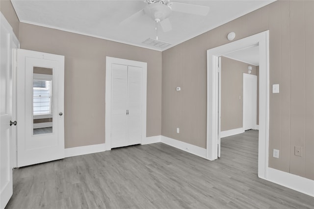 spare room featuring ceiling fan and light hardwood / wood-style floors