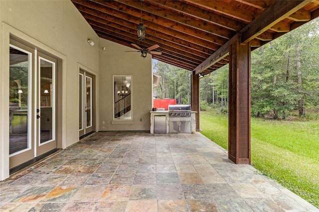 view of patio / terrace with ceiling fan and grilling area