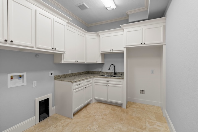 laundry area with ornamental molding, hookup for a washing machine, electric dryer hookup, sink, and light tile flooring