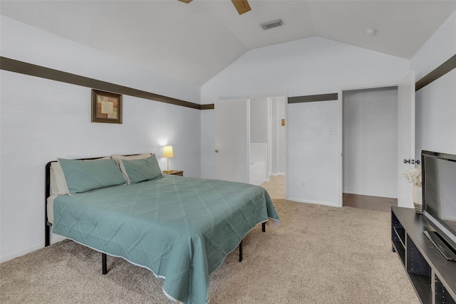 bedroom with ceiling fan, lofted ceiling, and light carpet