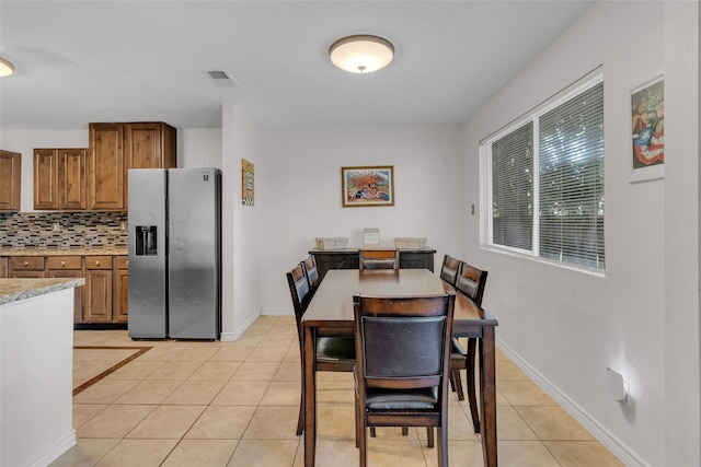 view of tiled dining area