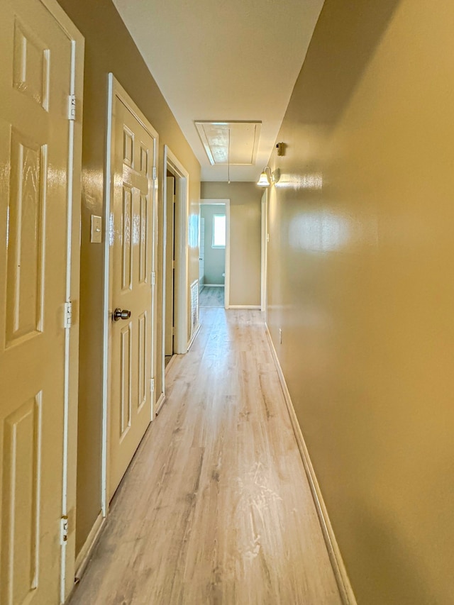 hall featuring light wood-type flooring