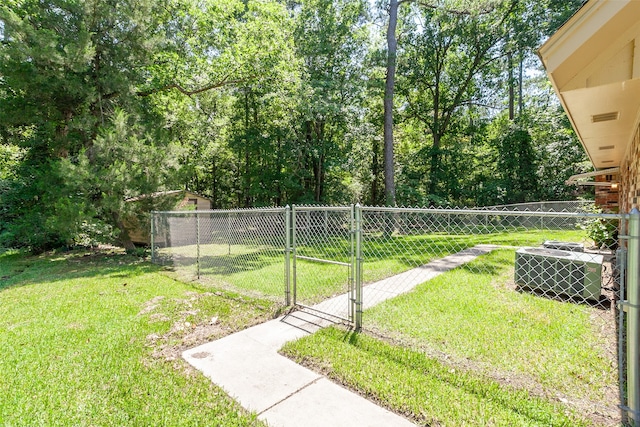 view of yard featuring central AC