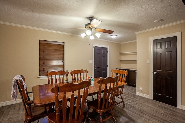 dining room featuring dark hardwood / wood-style flooring, ceiling fan, and a textured ceiling