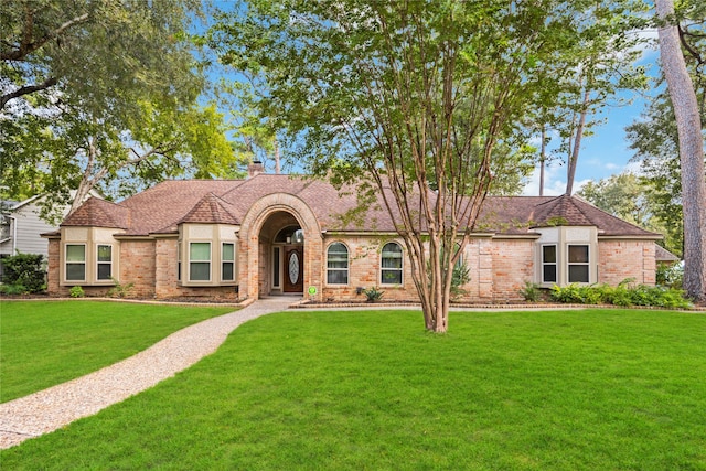 view of front of home with a front yard