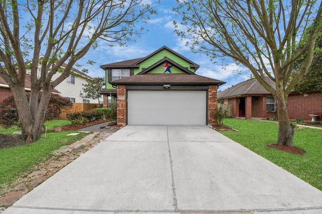 view of front of house featuring a garage and a front yard