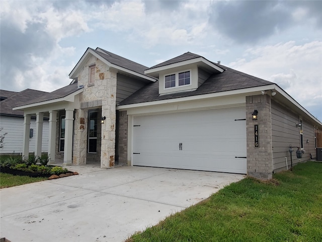 view of front of home with a garage