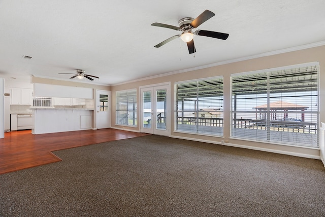 unfurnished living room featuring hardwood / wood-style flooring, ornamental molding, and ceiling fan