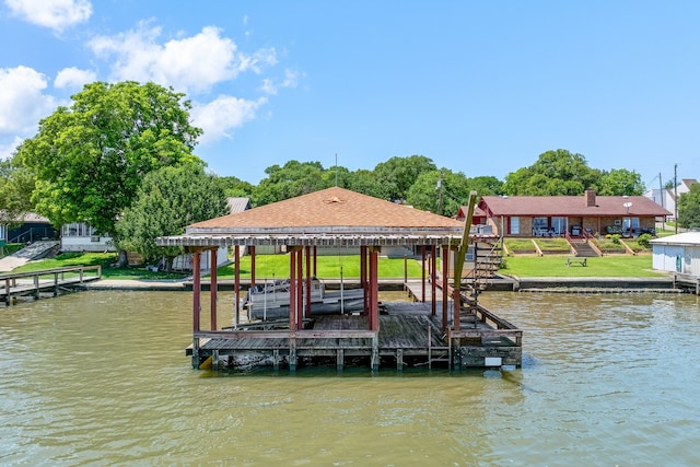 dock area with a water view