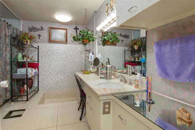 bathroom featuring tile flooring and vanity