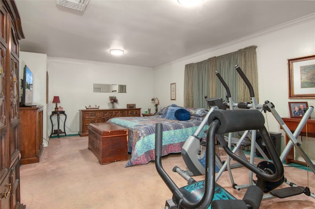 bedroom featuring ornamental molding and light colored carpet