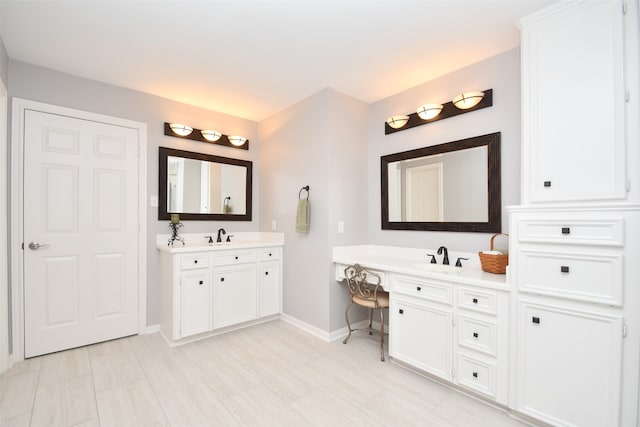 bathroom with double sink vanity and tile floors