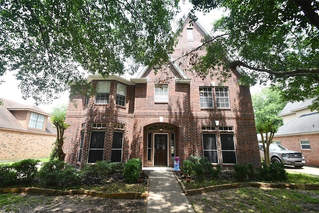 view of front of property with a balcony