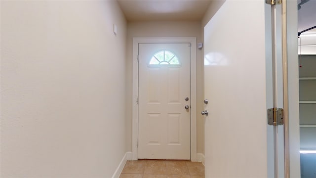 entryway featuring light tile floors