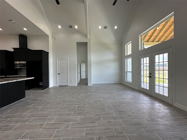 kitchen featuring ceiling fan, high vaulted ceiling, french doors, and light tile patterned floors