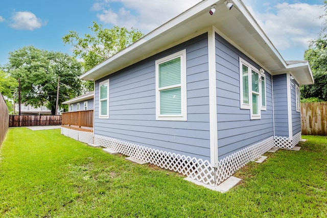 view of home's exterior featuring a yard