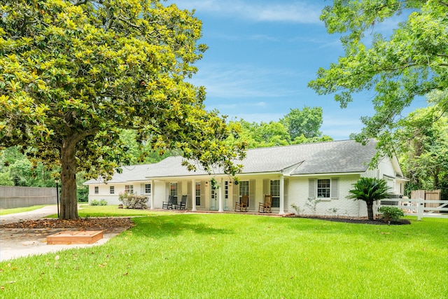 ranch-style home with a front yard