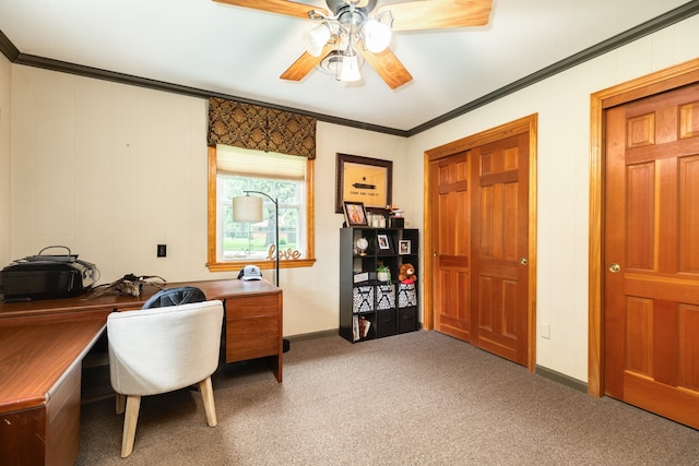 carpeted office with ornamental molding and ceiling fan