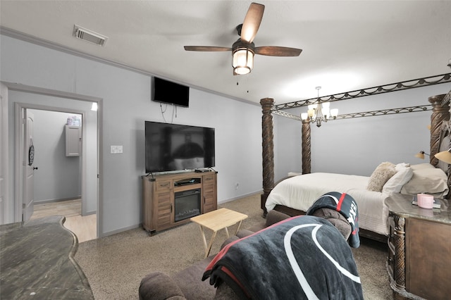 bedroom featuring ceiling fan with notable chandelier and ornamental molding