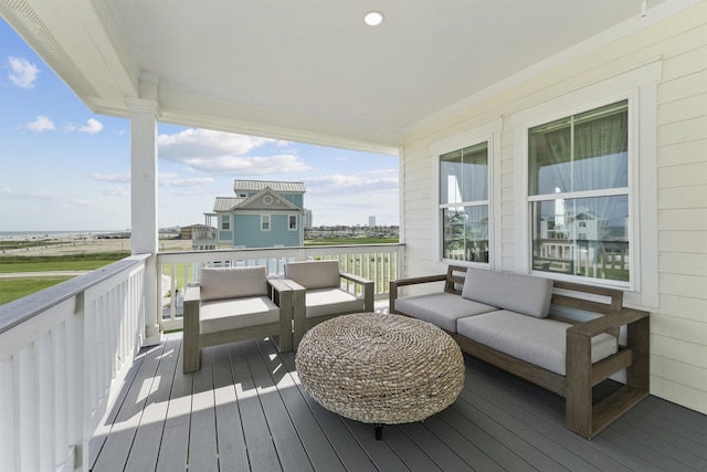 deck featuring outdoor lounge area