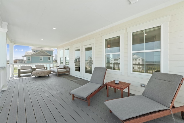 deck featuring french doors and an outdoor hangout area