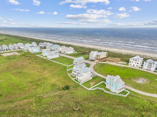 aerial view with a beach view and a water view