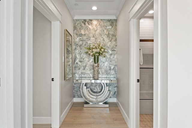 interior space with crown molding and wood-type flooring