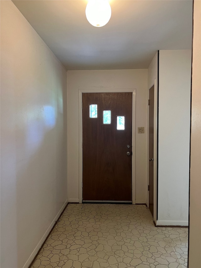 entrance foyer with tile flooring