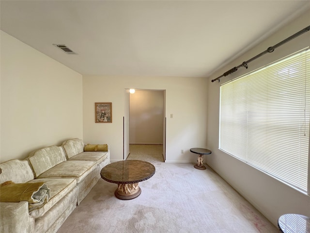 living room with light colored carpet