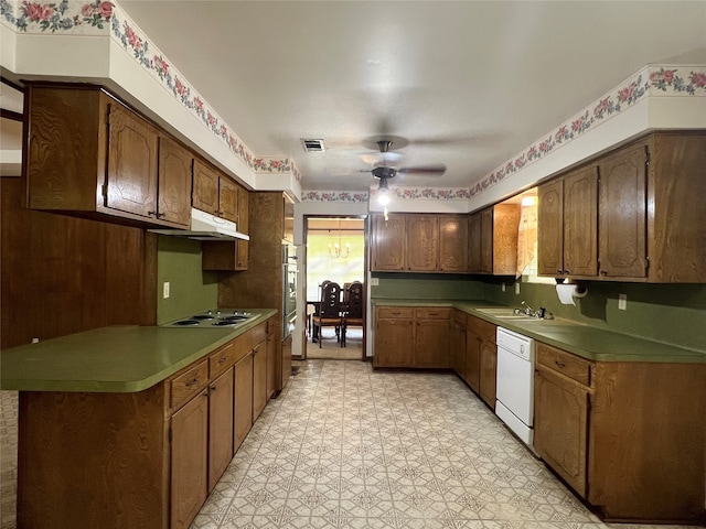 kitchen with white appliances, sink, ceiling fan, and light tile floors