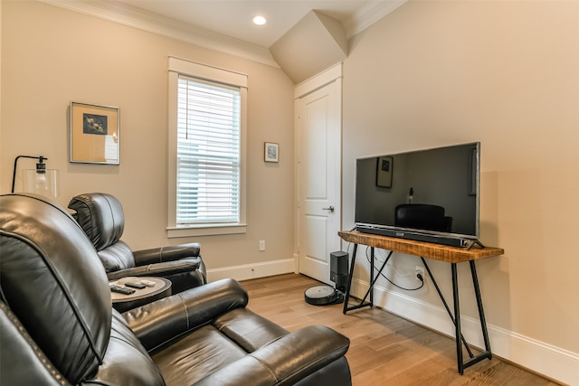 interior space featuring crown molding, plenty of natural light, and light wood-type flooring