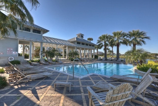 view of pool featuring a patio