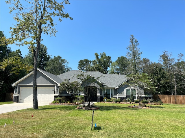 single story home with a front lawn and a garage